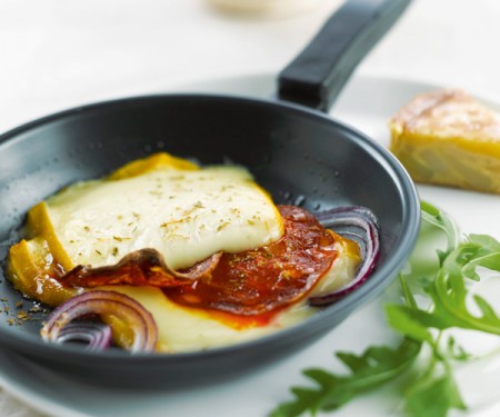 une raclette fait avec la poêle